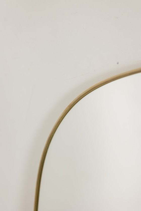 Image 1 of Gio Ponto, in de stijl van. Een paar spiegels omlijst met verguld messing. Jaren 80.