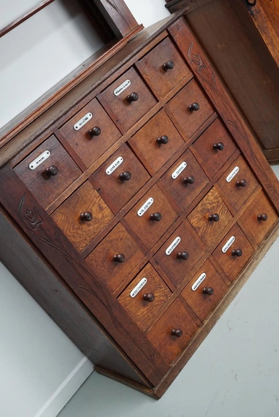 Image 1 of Coppia di vetrine/armadietti da farmacia antichi in rovere olandese in stile Art Nouveau, ca. 1904