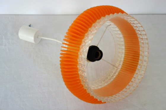 Space age chandelier in transparent plastic with orange 70s strip – Pendant lamps (photo 12 of 12)