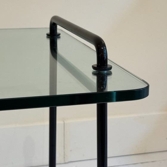 Image 1 of Italienischer Beistelltisch aus Glas mit schwarzem Metallgestell