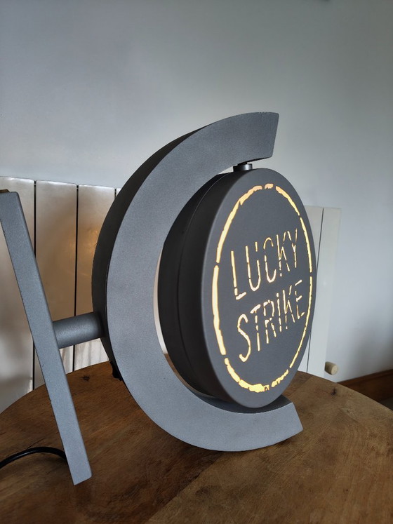 Image 1 of Vintage draaiend lichtreclamebord Lucky Strike