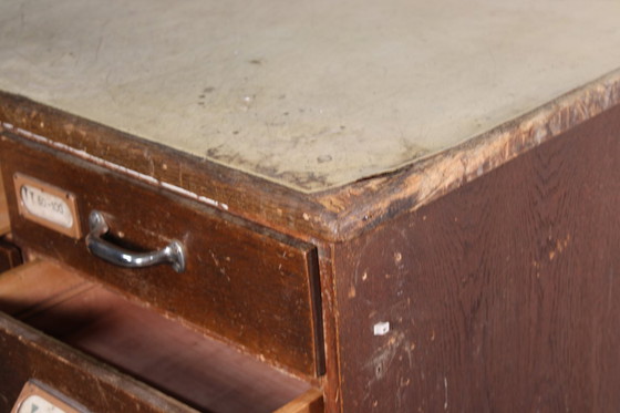 Image 1 of Antique industrial apothecary cabinet • Vintage wood and metal drawer cabinet with many compartments