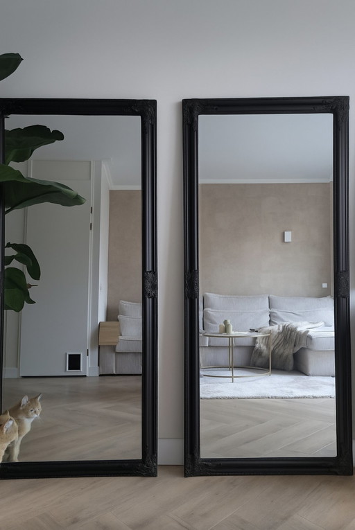 2 large black mirrors hotel chic with facet