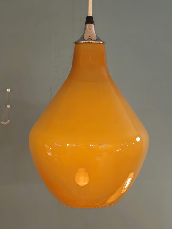 Image 1 of Suspension vintage en verre jaune ambré