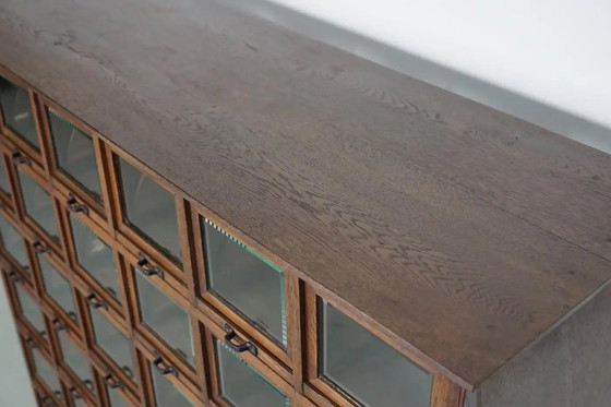 Image 1 of Mobiletto antico tedesco in rovere per merceria, anni '20/'30