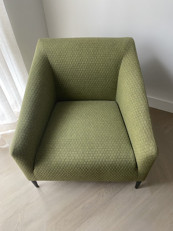 Image 1 of Sijben armchair in moss green fabric with matte black steel legs.