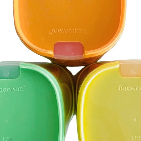 Image 1 of Vintage set Tupperware Colombo Skyline voorraadpotten 1.5 liter geel groen oranje 1990's