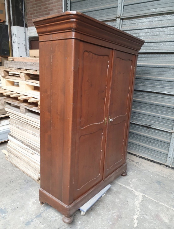 Image 1 of Pine 2-door cabinet, nice to restore, paint in a modern color with an antique look.