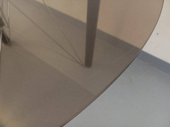 Image 1 of Vintage round dining table in smoked glass, black metal and chrome metal from the 80s