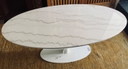Oval table in white marble