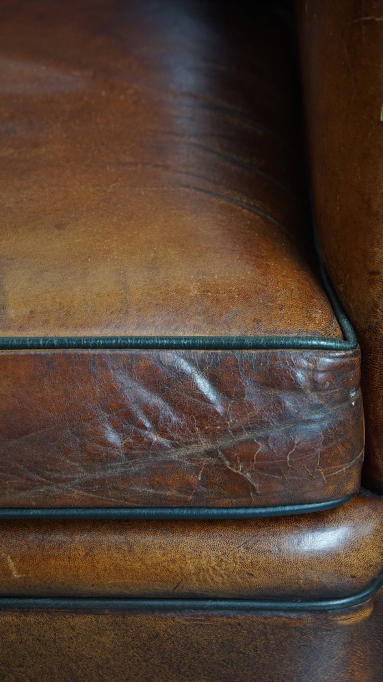 Image 1 of Schapenleren design fauteuil/ armchair in een cognac kleur