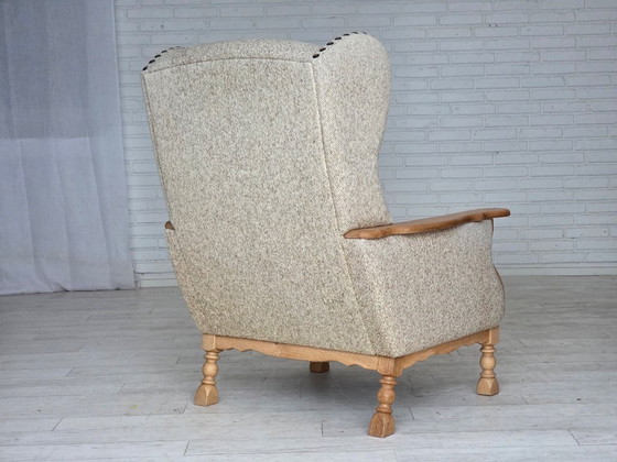 Image 1 of Deense fauteuil met hoge rugleuning uit de jaren 70, bekleed met meubelwol en gemaakt van massief eikenhout.