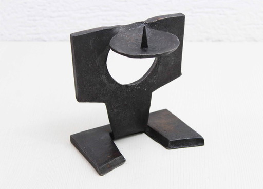 Candelabro de hierro fundido brutalista