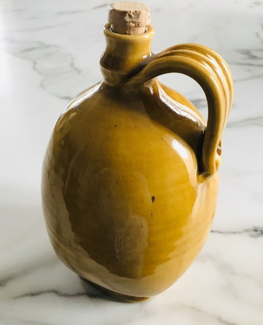 Glazed earthenware jar or jug with handle