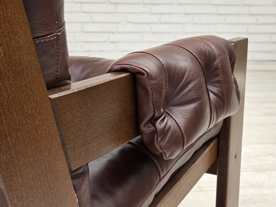 Image 1 of 1970, Scandinavische fauteuil met hoge rugleuning, bruin meubelleder, donker beukenhout.