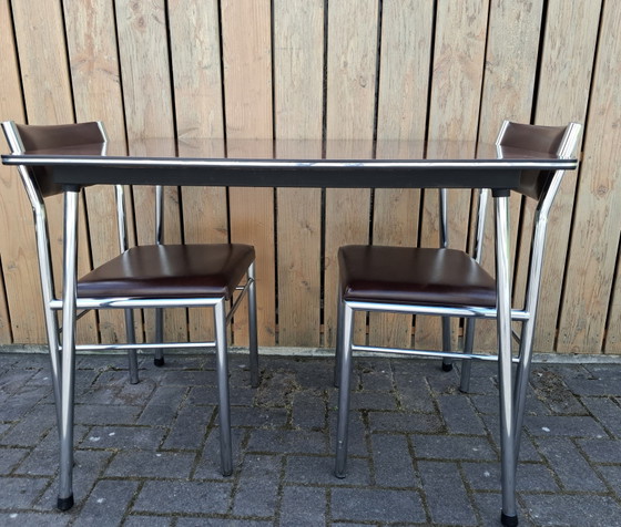 Image 1 of Vintage kitchen table with 2 chairs. 1960s