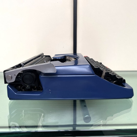 Image 1 of Macchina da scrivere Brother Deluxe 250TR blu, anni '70, con custodia, prodotta in Giappone.