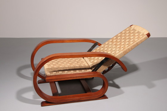 Image 1 of Een uitzonderlijk zeldzame mahoniehouten fauteuil gemaakt in Italië in de jaren 1950