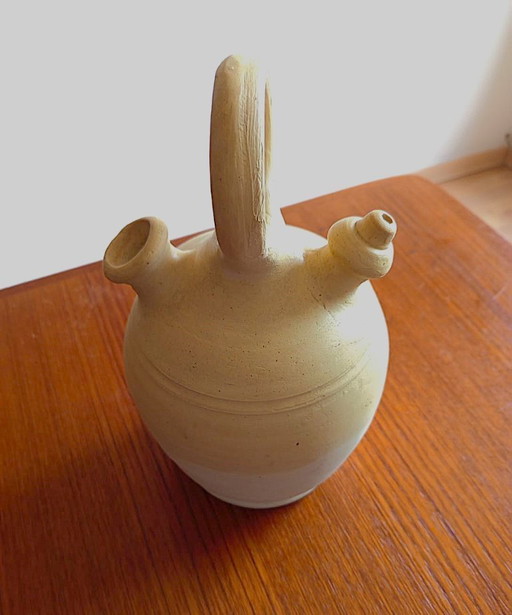 white clay water jug or pitcher