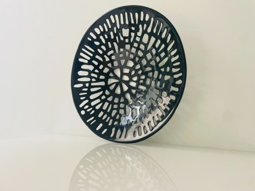 Graphic design bowl made of black coated steel