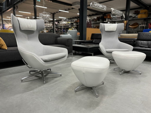 2 Leolux Caruzzo Plus Relax armchairs with white ottoman 