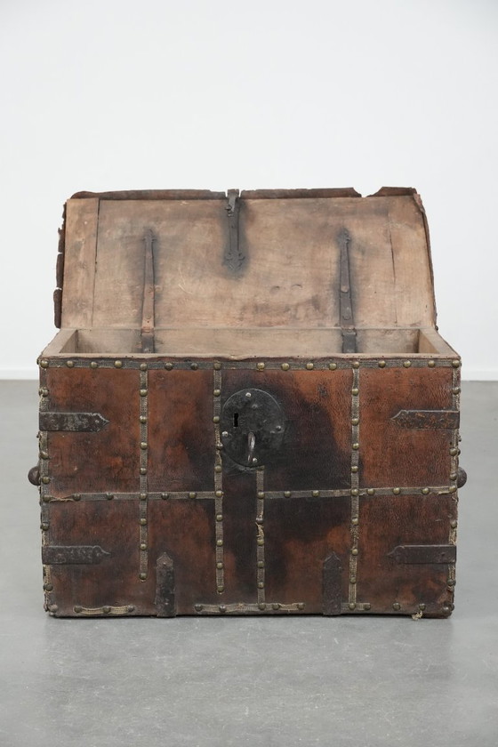 Image 1 of Antique 17th century chest/safe covered with leather and original key