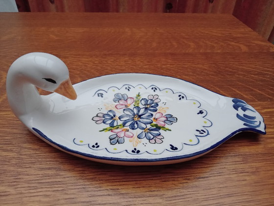 Image 1 of Piatto con testa d'oca e coltello abbinato