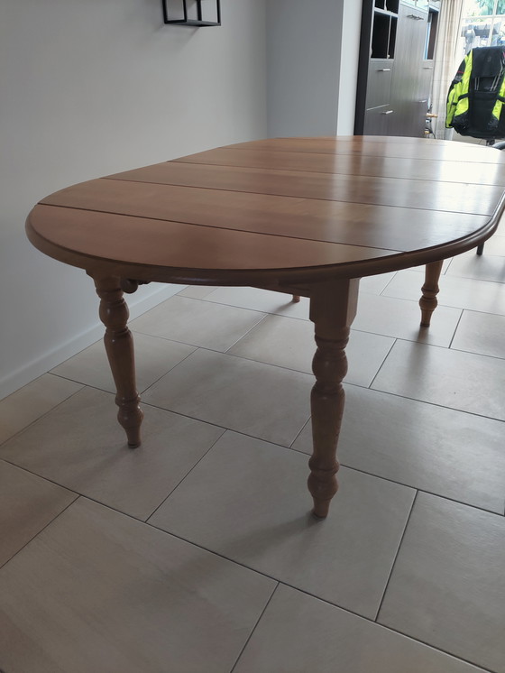 Image 1 of In large adjustable oak table