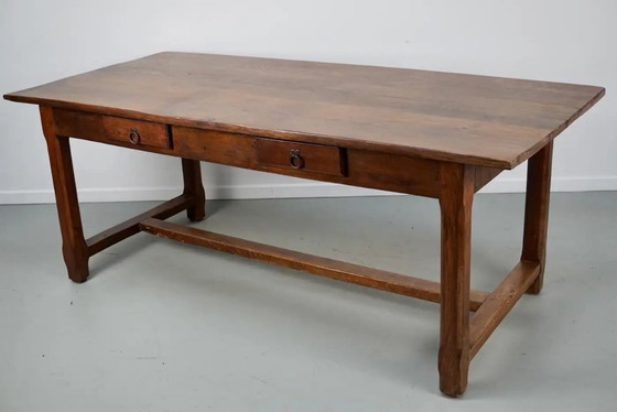 Image 1 of Early 20th-century French rustic country dining table made of oak and elm