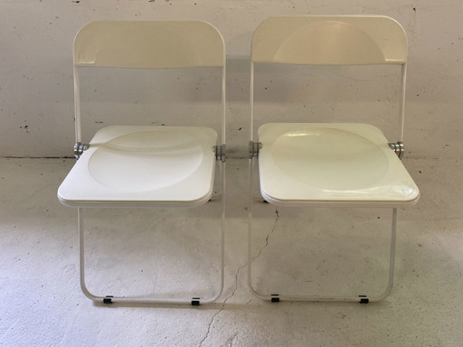 2x Giancarlo Piretti 'Plia' stoelen