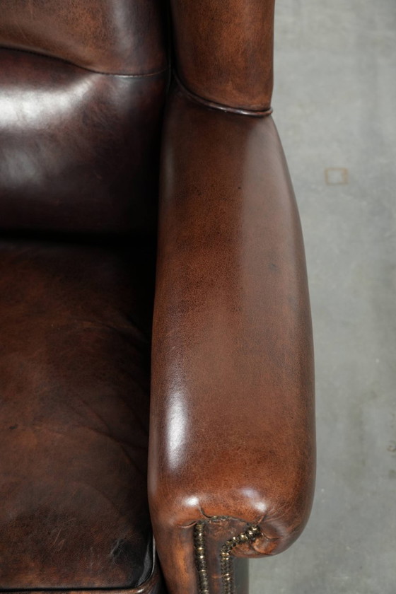 Image 1 of Wunderschöner, großer Ohrensessel mit Schaffellbezug in warmen, satten Farben