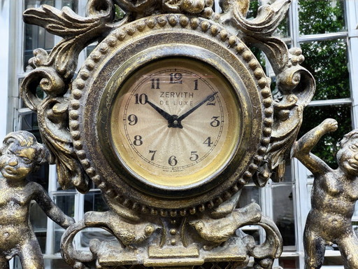 Elegant shelf clock in baroque/rococo style