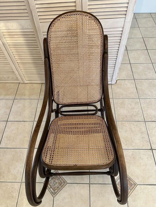 Original Thonet rocking chair model 7010 (1881-1919) with some...