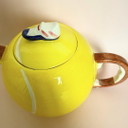 Tea pot and cups for a tennis lover