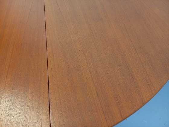 Image 1 of Vintage Scandinavian style round teak dining table from the 1950s/60s with extension