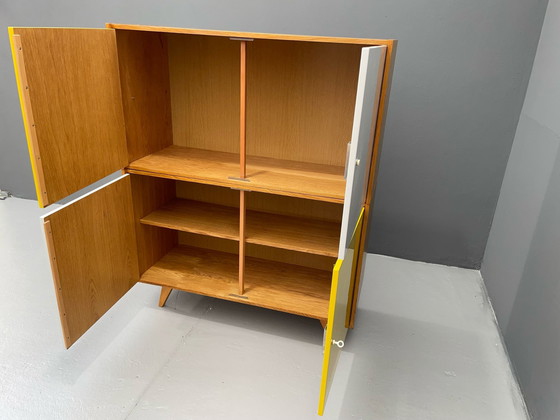 Image 1 of Armoire U-450 en placage de chêne, variante jaune et blanche, Jiří Jiroutek pour Interiér Praha, années 1960