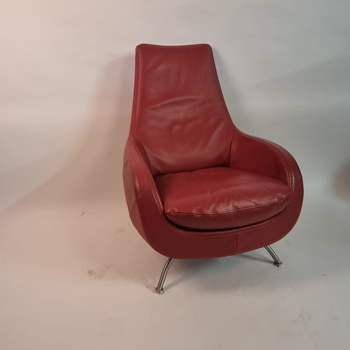 Poltrona girevole in pelle rossa Rolf Benz