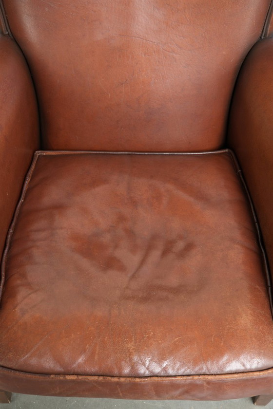 Tijdloze fauteuil/ armchair gemaakt van schapenleer met een mooie Engelse uitstraling – Leather (photo 6 of 13)