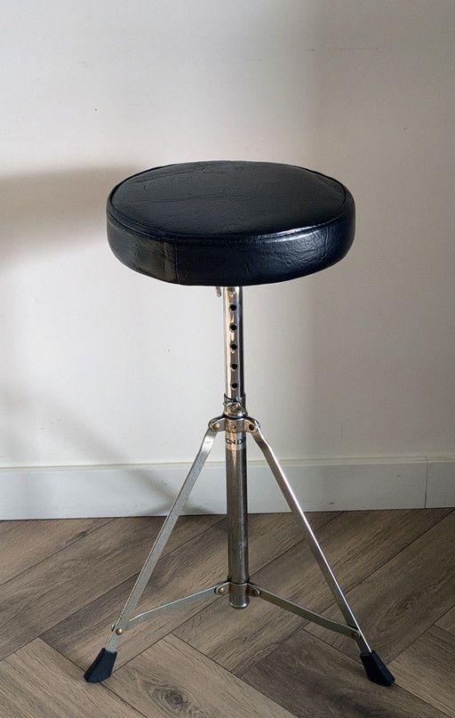 Vintage adjustable Canon stool