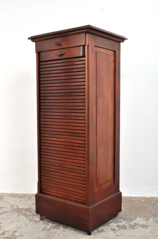 Antico mobiletto con anta a rullo in mogano, anni 1880