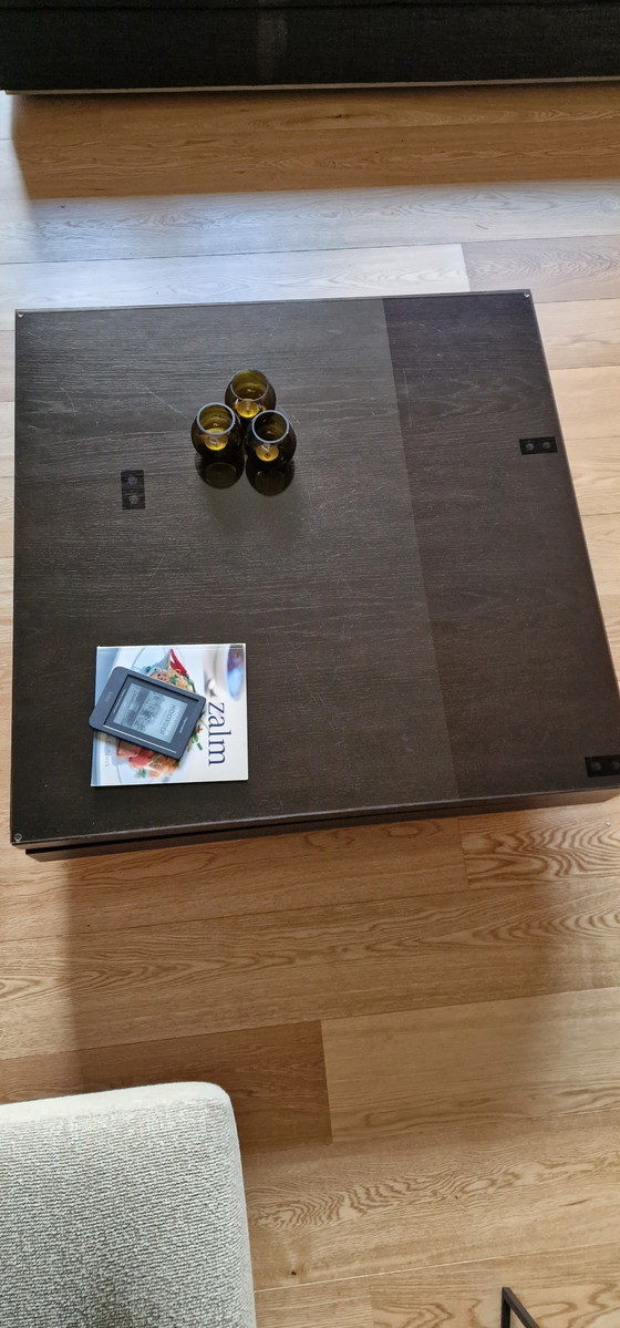 Image 1 of Veneer coffee table with dark glass top