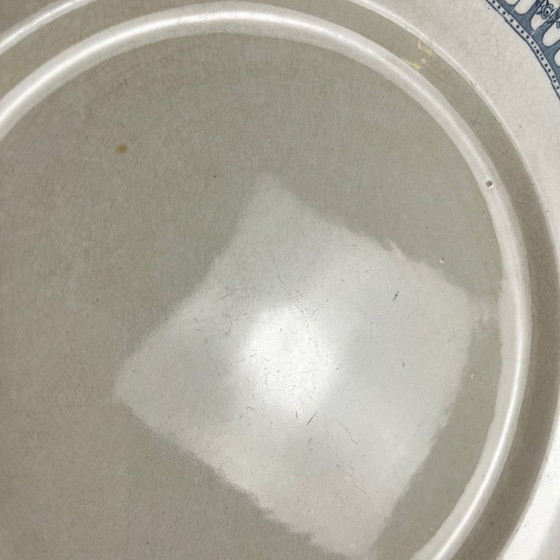 Image 1 of Plato redondo de loza procedente de Salins, de finales del siglo XIX o principios del siglo XX.