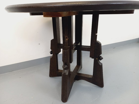 Image 1 of Table basse ronde modulable en table à manger “monte et baisse” vintage Guillerme et Chambron en chêne massif et céramique