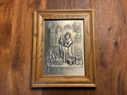 Tinnen reliëf in mooie eiken kader