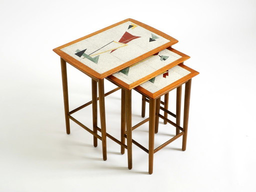 Original Mid Century Modern set of 3 teak nesting tables with colorful Formica surfaces