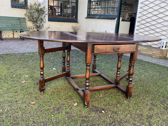 Image 1 of Antique English gateleg table, solid wood, oval, extendable