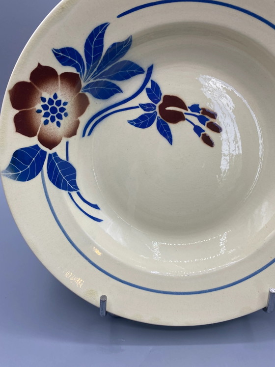 Plat profond en faïence bleue et brune à motifs floraux Art déco – Objets déco, Art Deco (photo 2 of 4)