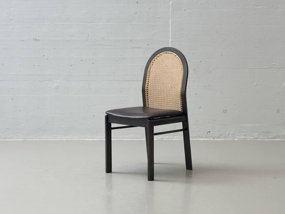 Image 1 of Set van 6 stoelen met rieten en lederen zittingen van Dietiker, jaren 80.
