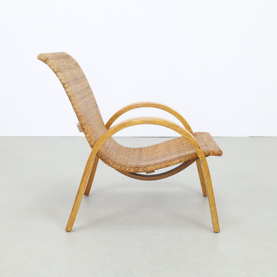 Image 1 of Rare fauteuil vintage en bois et canne, 1960S