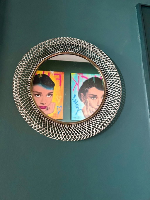 Bauhaus wall mirror with expanded metal frame in the style of the French designer Mathieu Matégot, France, 1950s.